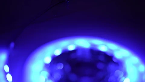 Led strip coil closeup. Diode shining stripe on dark blue background. Stock Footage 113011779