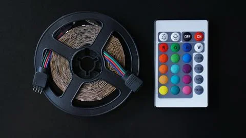 Led strip coil closeup. Diode with control panel for switching colors Stock Photos