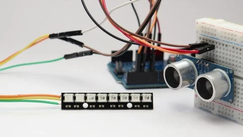 LED strip glowing colors with sensor module and microcontroller Stock Footage 339018260