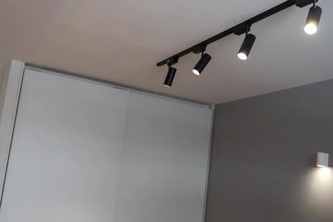 Led track lamp on the ceiling in the interior. Stock Photos