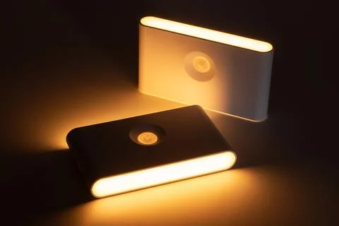 LED White Night Light Sensor. Smart Wall Lamp For Bathroom Bedroom Home Kit.. Stock Photos