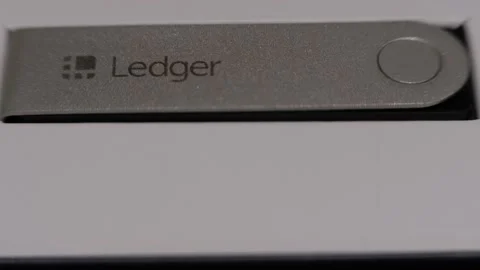 Ledger Nano X - Cryptocurrency Hardware Wallet - Tilt Up Video stock 153294119