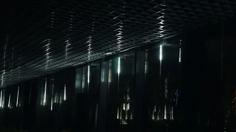 LEDs flash on the windows against the background of the city Stock Footage 102225876