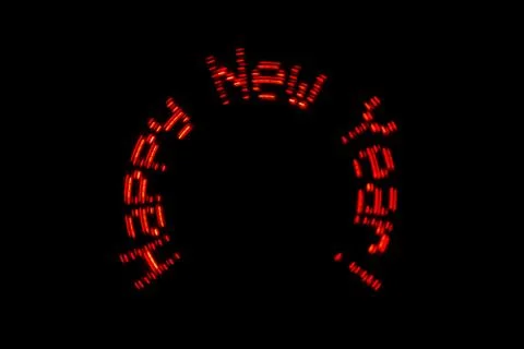 LEDs move in a circle and create the inscription "Happy New Year!" Stock Photos