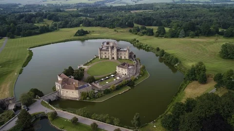 Leeds Castle with moat and architecture with pretty countryside, drone aerial 4K Stock Footage 101176580