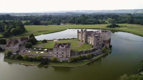 Leeds Castle with moat and impressive architecture, drone aerial 4K Stock Footage 101176161