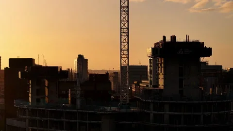 Leeds City Centre at Dawn: Construction Cranes and Stock-Footage 310698052