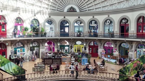 Leeds Corn Exchange - Visitors and Shoppers in Victorian Trading Hall 動画素材 338218498