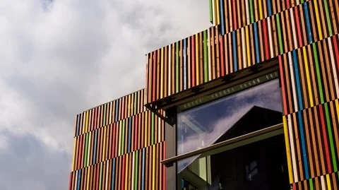 Leeds Docks Timelapse, Clouds Over Coloured Building 4K Stock Footage 99738770