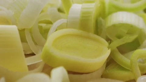 Leek onion macro close up. Leek onion stem and pieces close up. Fresh food Stock Footage 237525938