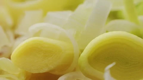 Leek onion macro close up. Leek onion stem and pieces close up. Fresh food Stock Footage 241753831