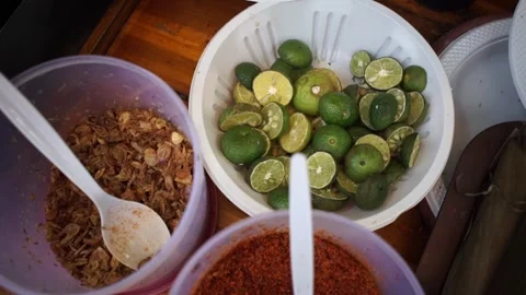 Leeks, lime wedges, fried onions, chili powder Stock Footage 265934964