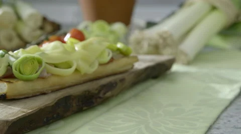 Leeks recipe display on kitchen worktop dolly left Stock Footage 63779326
