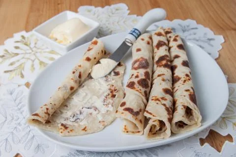 Lefse rolled on a plate Stock Photos
