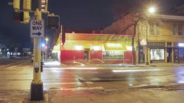 Left Adjusted One Way Sign and City Street Traffic Stock Footage 85575067
