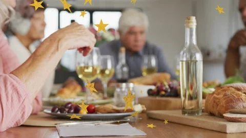Left arm reaching picking grapes drawing seated adults wine glasses stars Stock Footage 333975705