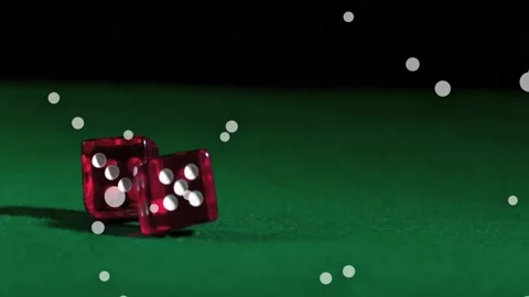Left bounce sending red die on green felt hitting die tumbling showing Stock Footage 328417195