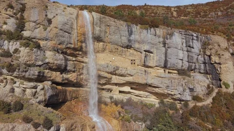 Left Drone Orbit Along Yebra de Basa Hermitages and Waterfall Stock Footage 345815078