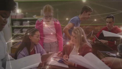 Left-front student showing tablet, peers taking notes for study while node Stock Footage 331235673
