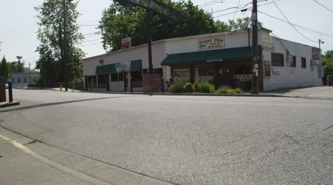 Left Front Three Quarter view of a Driving Plate: Car travels the length of SE Stock Footage 59270941