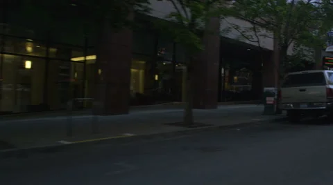 Left Front Three Quarter view of a Driving Plate: Car travels south on SW Stock Footage 59283525