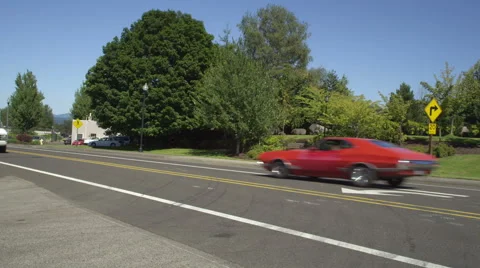 Left Front Three Quarter view of a Driving Plate: Car turns left onto Southwest Stock Footage 59295214