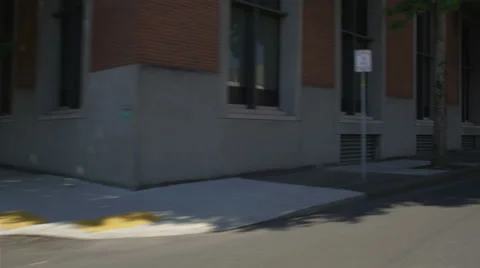 Left Front Three Quarter view of a Driving Plate: Car travels westbound on Stock Footage 59318934