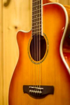 Left hand guitar on wall Stock Photos