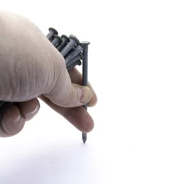Left Hand Holding Nails Stock Photos
