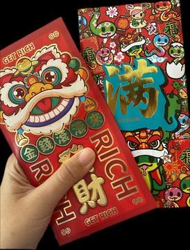 Left Hand Holding Red Envelopes for Chinese New Year Stock Photos