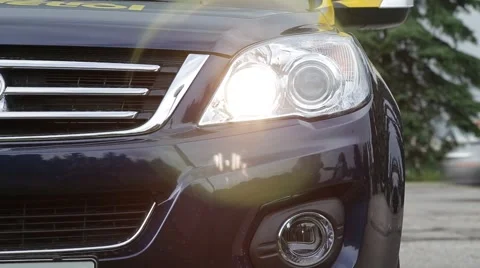 Left headlight of a jeep blinking Stock Footage 52208516