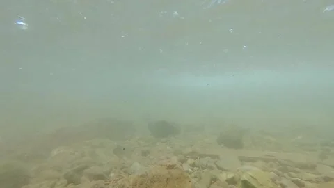 Left horizontal pan under river slow speed 1 Stock Footage 152358118