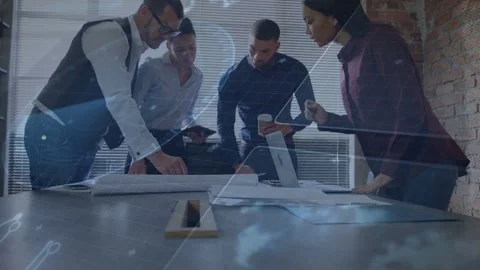 Left man leaning and pointing initiating design review, team refining plan as Stock Footage 333132767