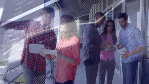 Left man pointing tablet, business team sharing phone and notes while data Stock Footage 333967289