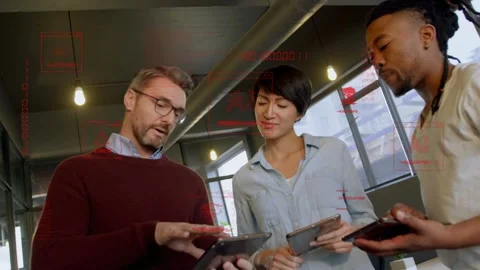 Left man tapping tablet, talking, team leaning while red AI MALWARE security Stock Footage 333704795