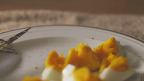 Left overs from breakfast. Hard boiled egg. Camera moves back Stock Footage 136655293