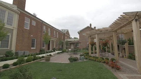 Left Pan of Lanscaped Courtyard Stock Footage 100899277