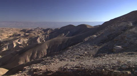 Left pan over barren hills of the Judean Desert near Jerusalem Stock Footage 59523034