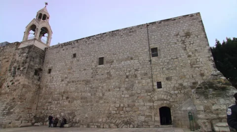Left pan over courtyard of the Church of the Nativity in Bethlehem Stock Footage 59523327