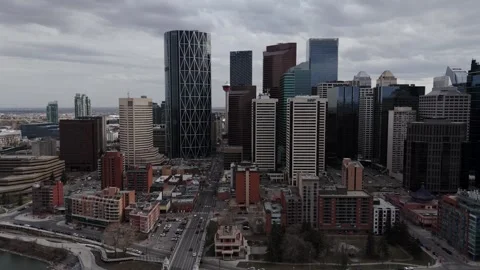 Left Pan Reveal of Calgary Tower and Centre Street in Downtown Calgary Видео 336354745
