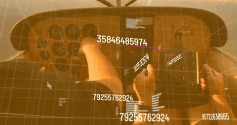 Left pilot turning knob and right pilot scanning as holographic data flowing Stock Footage 315716770