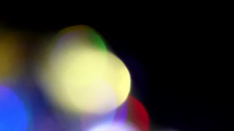 Left rainbow back and forth movement of the hand bokeh Stock Footage 309426629