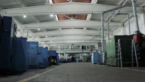 Left to right along a large gray high empty pantry in a factory Stock Footage 111368465