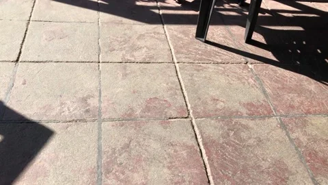 Left To Right Camera Pan Of Floor Tiles From Sunlight To Shadows Stock Footage 138018760