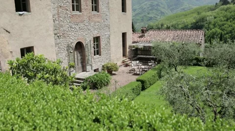 Left to right glide towards old villa in Tuscany with Canon 1Dc Stock Footage 51798568