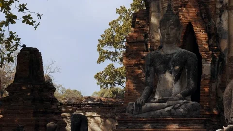 Left to right movement Old statue of Buddha - Ayutthaya, Thailand Stock Footage 176157738