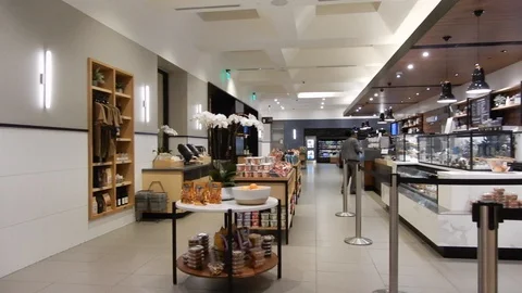 Left To Right Pan Of Cafeteria Store In High Class Luxury Hotel Stock Footage 128312602