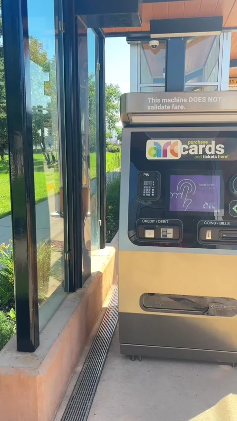 Left to right pan of an ETS arc card fare vending machine Stock Footage 342477475
