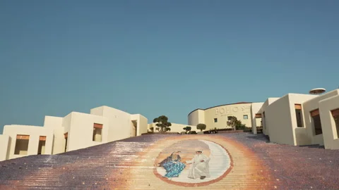 Left to right pan of the famous colorful mosaic staircase mural at Katara. Stock Footage 337357219