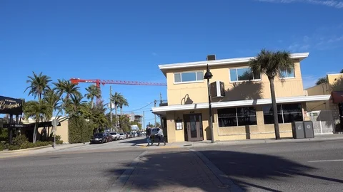 Left To Right Pan People At Beach Resort Walking On Street Visiting Shops Stock Footage 127375353